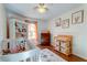 Brightly decorated Bedroom featuring hardwood floors, white crib, dresser, changing table, and natural light at 1257 Maryland Dr, Ladson, SC 29456