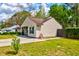 Charming single-story home with green shutters and a well-manicured lawn at 1257 Maryland Dr, Ladson, SC 29456