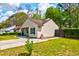 Exterior side view of home with walkway and green lawn at 1257 Maryland Dr, Ladson, SC 29456
