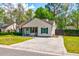 Well-maintained single-story home with tidy lawn and a concrete driveway and walkway at 1257 Maryland Dr, Ladson, SC 29456