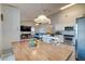 Open floor plan features a kitchen that flows into the living room and dining area at 1257 Maryland Dr, Ladson, SC 29456