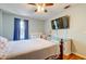 Comfortable main bedroom with wood floors, ceiling fan, dresser, and large bed at 1257 Maryland Dr, Ladson, SC 29456