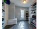 Storage room features a utility sink, an exterior door, built-in bench, and shelving at 1257 Maryland Dr, Ladson, SC 29456
