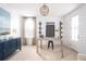 Home office with blue cabinet, desk, carpeted floors and natural light at 136 Maritime Way, Summerville, SC 29485