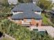 Aerial view highlighting the backyard pool and deck area with a well-maintained yard at 1369 Tidal Creek Cv, Charleston, SC 29412