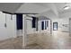 Finished basement with herringbone tile flooring, white walls, air conditioner, and some curtains at 1369 Tidal Creek Cv, Charleston, SC 29412