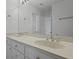 Bathroom featuring double sink vanity with white cabinets, and chrome hardware at 1369 Tidal Creek Cv, Charleston, SC 29412
