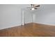 Large bedroom boasting hardwood floors and multiple doors for versatile access and flow at 1369 Tidal Creek Cv, Charleston, SC 29412