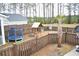 Spacious backyard with a play set, trampoline, and basketball hoop, perfect for Gathering fun at 149 Greenbelt Ct, Summerville, SC 29485