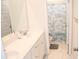 Bathroom featuring double vanity and shower with stylish blue palm tree curtain at 149 Greenbelt Ct, Summerville, SC 29485