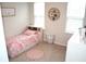 Cozy bedroom with floral bedding, whimsical decor and a round rug at 149 Greenbelt Ct, Summerville, SC 29485