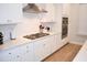 Bright kitchen with white cabinets, stainless steel appliances, and a gas range for the ultimate cooking experience at 149 Greenbelt Ct, Summerville, SC 29485