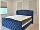 Spacious bedroom features a large blue bed at 1510 Cecile St, Mount Pleasant, SC 29464