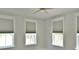 Bright bedroom featuring neutral walls, modern windows with privacy shades, and ample natural light at 1510 Cecile St, Mount Pleasant, SC 29464