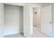 Walk-in closet features neutral walls and carpeting, wire shelving, and paneled door at 1510 Cecile St, Mount Pleasant, SC 29464