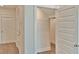 View of a walk-in closet with a metal shelf at 1510 Cecile St, Mount Pleasant, SC 29464
