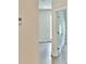Hallway showing a door leading to another room with gray flooring at 1510 Cecile St, Mount Pleasant, SC 29464