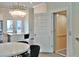 Open floor plan with stainless steel appliances, pendant lighting, and lift access provides a blend of luxury and accessibility at 1510 Cecile St, Mount Pleasant, SC 29464