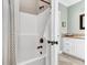 Updated bathroom with white shower stall, with vanity offering ample storage, and a convenient shower stall at 1626 Bull Creek Ln, Charleston, SC 29414