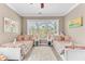 Charming bedroom with two beds, whimsical decor, and natural light at 1626 Bull Creek Ln, Charleston, SC 29414