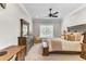 Comfortable bedroom with neutral tones, large window, and a cozy seating area at 1626 Bull Creek Ln, Charleston, SC 29414