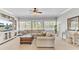 Relaxing bonus room with comfortable seating, built-in shelves, and plenty of natural light at 1626 Bull Creek Ln, Charleston, SC 29414