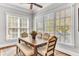 Cozy dining area with large windows providing ample natural light and a comfortable seating arrangement at 1626 Bull Creek Ln, Charleston, SC 29414