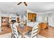 Charming dining area with hardwood floors, flowing into living room and adjacent to a modern kitchen at 1626 Bull Creek Ln, Charleston, SC 29414