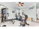 Exercise room with neutral paint color, ceiling fan, and doorway to bathroom at 1626 Bull Creek Ln, Charleston, SC 29414
