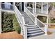 Inviting front entrance with gray and white staircase with the house number 1626 at 1626 Bull Creek Ln, Charleston, SC 29414