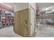 Well-organized garage featuring storage racks, an elevator, and ample lighting at 1626 Bull Creek Ln, Charleston, SC 29414