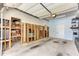 Spacious garage with unfinished walls and visible framing, and great potential for customization and storage at 1626 Bull Creek Ln, Charleston, SC 29414