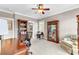 Spacious office featuring built-in shelves, a desk, and an inviting armchair perfect for remote work at 1626 Bull Creek Ln, Charleston, SC 29414