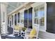 Relaxing porch with comfortable seating, stylish decor, and natural light at 1626 Bull Creek Ln, Charleston, SC 29414