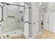 Glass-enclosed shower features marble tile and a sleek, modern design at 1626 Bull Creek Ln, Charleston, SC 29414