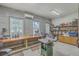 Well-lit workshop featuring worktables, a variety of tools, and ample space at 1626 Bull Creek Ln, Charleston, SC 29414