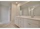 Well-lit bathroom with double sinks, a large mirror, and neutral finishes for a clean and modern look at 197 Belfort Pl, Summerville, SC 29486
