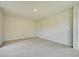 Spacious, carpeted bedroom with ample natural light, closet, and neutral color palette to personalize and enjoy at 197 Belfort Pl, Summerville, SC 29486