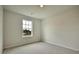 Cozy bedroom with plush carpeting, a well-lit window, and ample space for relaxation and rest at 197 Belfort Pl, Summerville, SC 29486