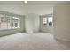 Sun-filled bedroom with carpeted floor, neutral walls, and abundant natural light from multiple windows to personalize at 197 Belfort Pl, Summerville, SC 29486
