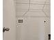 Laundry room featuring wire shelving, neutral walls, and access to essential utilities at 197 Belfort Pl, Summerville, SC 29486