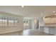 Bright living room features recessed lighting and large windows, seamlessly connecting to the kitchen at 197 Belfort Pl, Summerville, SC 29486