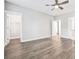 Bright and airy bedroom with hardwood floors and multiple doorways at 1984 Shadetree Blvd, Johns Island, SC 29455