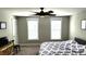 Bedroom with two windows and ceiling fan, offers a relaxing space at 1984 Shadetree Blvd, Johns Island, SC 29455