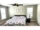 Bright bedroom with a ceiling fan and lots of natural light from two windows at 1984 Shadetree Blvd, Johns Island, SC 29455