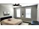 Cozy bedroom with modern decor, large windows, and a comfortable bed with stylish accents at 1984 Shadetree Blvd, Johns Island, SC 29455