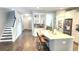 Bright kitchen with white cabinets, a center island, and stainless steel appliances offering a blend of style and functionality at 1984 Shadetree Blvd, Johns Island, SC 29455