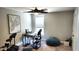 Bedroom converted to an office, featuring a desk, chair, beanbag, and drumset at 1984 Shadetree Blvd, Johns Island, SC 29455