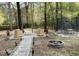 Backyard with outdoor seating, a fire pit, and a trampoline at 203 Arbor Oaks Dr, Summerville, SC 29485