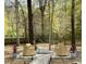 Lush backyard showcasing an outdoor seating area at 203 Arbor Oaks Dr, Summerville, SC 29485